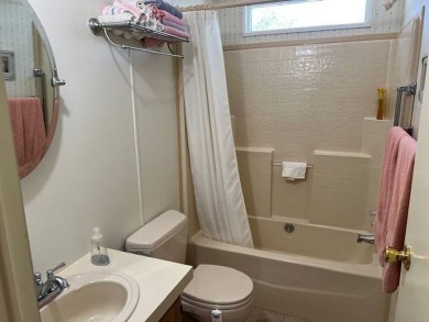 Discover this beautifully furnished 3-bedroom, 2-bathroom home on Crystal Lake Club in Florida - for sale on GolfHomes.com, golf home, golf lot