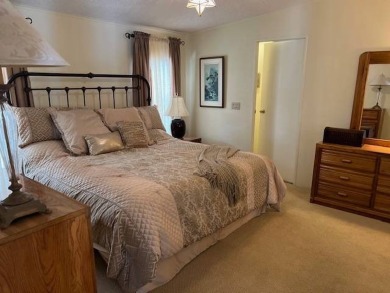 Discover this beautifully furnished 3-bedroom, 2-bathroom home on Crystal Lake Club in Florida - for sale on GolfHomes.com, golf home, golf lot