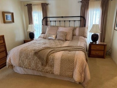 Discover this beautifully furnished 3-bedroom, 2-bathroom home on Crystal Lake Club in Florida - for sale on GolfHomes.com, golf home, golf lot