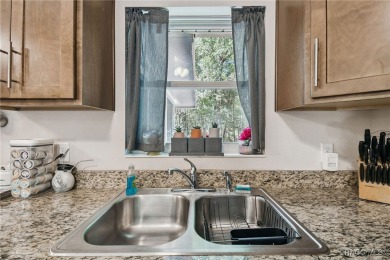 Tucked away on a VERY INTIMATE and ISOLATED.55-acre corner lot on Citrus Springs Country Club in Florida - for sale on GolfHomes.com, golf home, golf lot