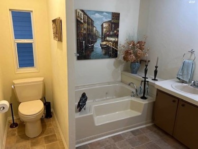 Discover this beautifully furnished 3-bedroom, 2-bathroom home on Crystal Lake Club in Florida - for sale on GolfHomes.com, golf home, golf lot
