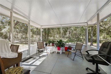 Tucked away on a VERY INTIMATE and ISOLATED.55-acre corner lot on Citrus Springs Country Club in Florida - for sale on GolfHomes.com, golf home, golf lot