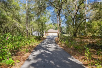 Tucked away on a VERY INTIMATE and ISOLATED.55-acre corner lot on Citrus Springs Country Club in Florida - for sale on GolfHomes.com, golf home, golf lot