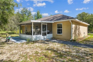 Tucked away on a VERY INTIMATE and ISOLATED.55-acre corner lot on Citrus Springs Country Club in Florida - for sale on GolfHomes.com, golf home, golf lot