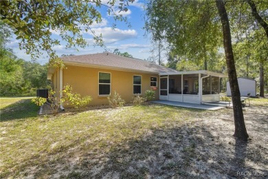 Tucked away on a VERY INTIMATE and ISOLATED.55-acre corner lot on Citrus Springs Country Club in Florida - for sale on GolfHomes.com, golf home, golf lot