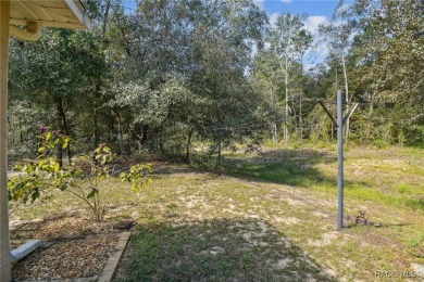 Tucked away on a VERY INTIMATE and ISOLATED.55-acre corner lot on Citrus Springs Country Club in Florida - for sale on GolfHomes.com, golf home, golf lot