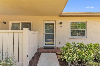 This beautifully updated 3-bedroom, 2-bath single-family home is on East Lake Woodlands Country Club in Florida - for sale on GolfHomes.com, golf home, golf lot