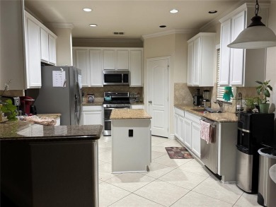 Huge 3-CAR GARAGE for protecting all your vehicles from on Lantana Golf Club in Texas - for sale on GolfHomes.com, golf home, golf lot