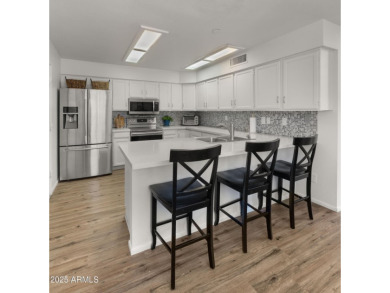 This gorgeous recently updated 3-bedroom residence located on The Lakes at Ahwatukee in Arizona - for sale on GolfHomes.com, golf home, golf lot