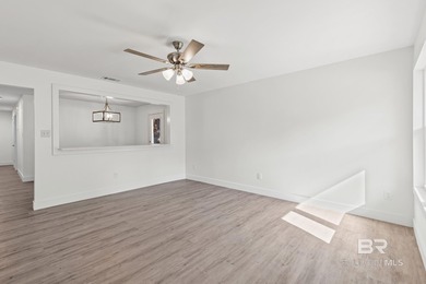 Freshly redesigned with today's sleek finishes and a warm on The Golf Club of the Wharf in Alabama - for sale on GolfHomes.com, golf home, golf lot