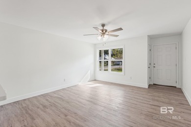 Freshly redesigned with today's sleek finishes and a warm on The Golf Club of the Wharf in Alabama - for sale on GolfHomes.com, golf home, golf lot