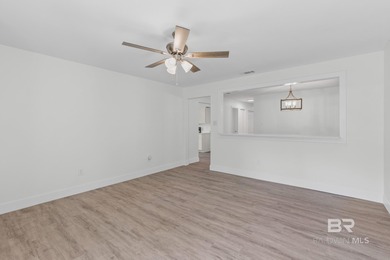 Freshly redesigned with today's sleek finishes and a warm on The Golf Club of the Wharf in Alabama - for sale on GolfHomes.com, golf home, golf lot