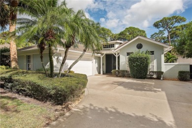 This completely renovated home sits directly on the golf course on Indian River Club in Florida - for sale on GolfHomes.com, golf home, golf lot