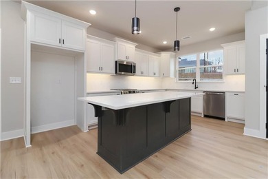 Open house this weekend at this new construction home! Located on Bella Vista Country Club - Highlands in Arkansas - for sale on GolfHomes.com, golf home, golf lot