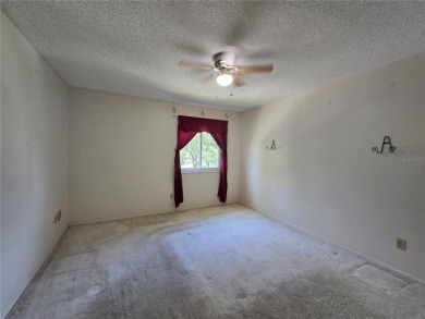 2nd floor condo located in the 55+ community of Live Oak Village on Country Club At Silver Springs Shores in Florida - for sale on GolfHomes.com, golf home, golf lot