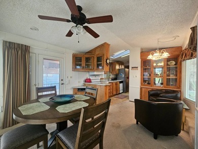 This charming 1-bedroom, 1.5-bathroom home with an Arizona room on Viewpoint Golf Resort in Arizona - for sale on GolfHomes.com, golf home, golf lot