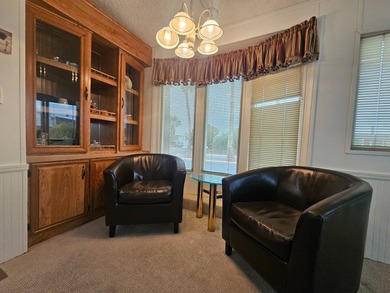 This charming 1-bedroom, 1.5-bathroom home with an Arizona room on Viewpoint Golf Resort in Arizona - for sale on GolfHomes.com, golf home, golf lot