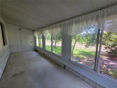 2nd floor condo located in the 55+ community of Live Oak Village on Country Club At Silver Springs Shores in Florida - for sale on GolfHomes.com, golf home, golf lot