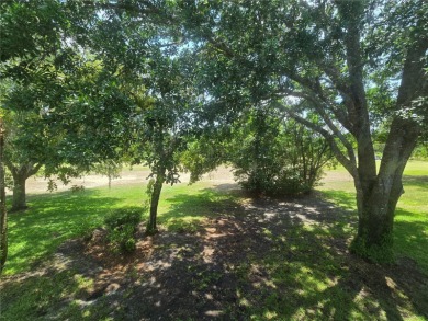 2nd floor condo located in the 55+ community of Live Oak Village on Country Club At Silver Springs Shores in Florida - for sale on GolfHomes.com, golf home, golf lot