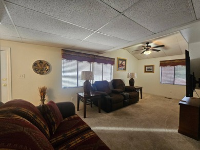 This charming 1-bedroom, 1.5-bathroom home with an Arizona room on Viewpoint Golf Resort in Arizona - for sale on GolfHomes.com, golf home, golf lot