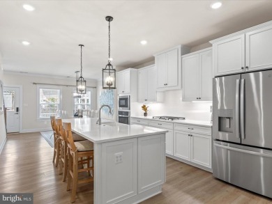 Welcome to this like-new, beautifully maintained townhome on The Peninsula Golf and Country Club in Delaware - for sale on GolfHomes.com, golf home, golf lot