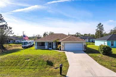 TURNKEY - Charming 3-bedroom, 2-bath home in Lehigh Acres! This on River Hall Country Club in Florida - for sale on GolfHomes.com, golf home, golf lot