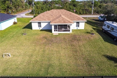 TURNKEY - Charming 3-bedroom, 2-bath home in Lehigh Acres! This on River Hall Country Club in Florida - for sale on GolfHomes.com, golf home, golf lot