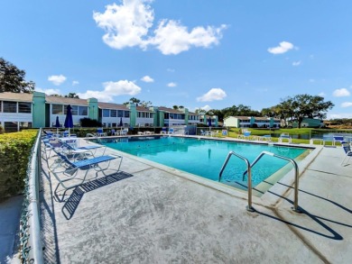 2nd floor condo located in the 55+ community of Live Oak Village on Country Club At Silver Springs Shores in Florida - for sale on GolfHomes.com, golf home, golf lot