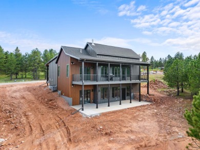 This is a magnificent, fully furnished new construction home on Boulder Canyon Country Club in South Dakota - for sale on GolfHomes.com, golf home, golf lot