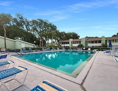 2nd floor condo located in the 55+ community of Live Oak Village on Country Club At Silver Springs Shores in Florida - for sale on GolfHomes.com, golf home, golf lot