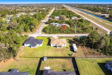TURNKEY - Charming 3-bedroom, 2-bath home in Lehigh Acres! This on River Hall Country Club in Florida - for sale on GolfHomes.com, golf home, golf lot