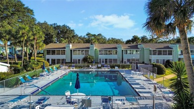 2nd floor condo located in the 55+ community of Live Oak Village on Country Club At Silver Springs Shores in Florida - for sale on GolfHomes.com, golf home, golf lot