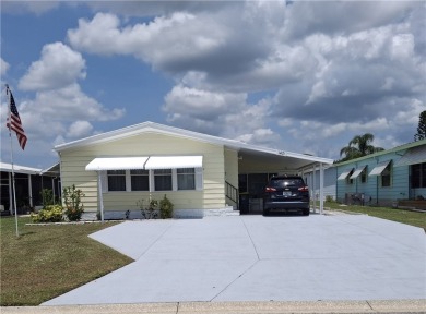 A great location for year-round or seasonal use. Within walking on Barefoot Bay Golf Course in Florida - for sale on GolfHomes.com, golf home, golf lot