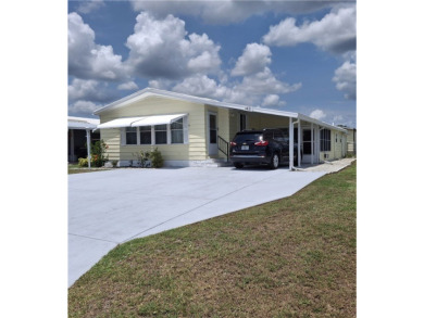 A great location for year-round or seasonal use. Within walking on Barefoot Bay Golf Course in Florida - for sale on GolfHomes.com, golf home, golf lot