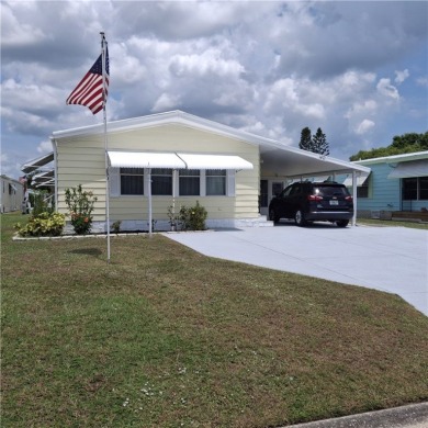 A great location for year-round or seasonal use. Within walking on Barefoot Bay Golf Course in Florida - for sale on GolfHomes.com, golf home, golf lot
