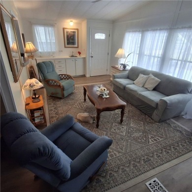 A great location for year-round or seasonal use. Within walking on Barefoot Bay Golf Course in Florida - for sale on GolfHomes.com, golf home, golf lot