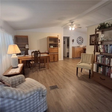 A great location for year-round or seasonal use. Within walking on Barefoot Bay Golf Course in Florida - for sale on GolfHomes.com, golf home, golf lot
