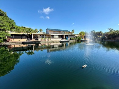 Waterfront townhome on Loch Lomond East across from Miami Lakes on Don Shulas Golf Course and Club in Florida - for sale on GolfHomes.com, golf home, golf lot