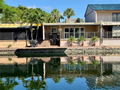 Waterfront townhome on Loch Lomond East across from Miami Lakes on Don Shulas Golf Course and Club in Florida - for sale on GolfHomes.com, golf home, golf lot