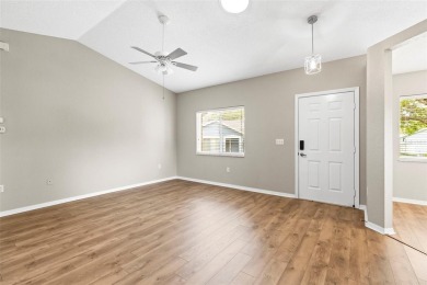 Nestled in the heart of a charming golf course community, this on Heather Golf and Country Club in Florida - for sale on GolfHomes.com, golf home, golf lot