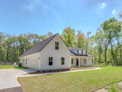 Exquisite new construction overlooking hole 6 of the new, state on Wildwood Country Club in Florida - for sale on GolfHomes.com, golf home, golf lot