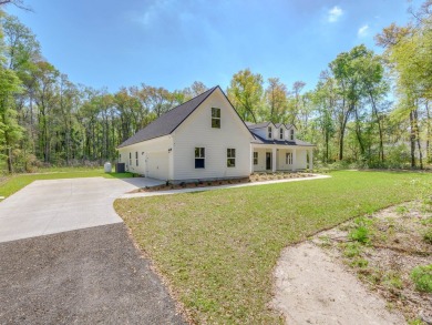 Exquisite new construction overlooking hole 6 of the new, state on Wildwood Country Club in Florida - for sale on GolfHomes.com, golf home, golf lot