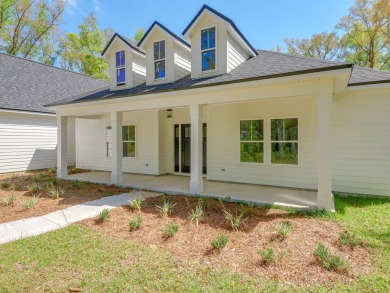 Exquisite new construction overlooking hole 6 of the new, state on Wildwood Country Club in Florida - for sale on GolfHomes.com, golf home, golf lot
