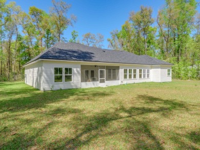 Exquisite new construction overlooking hole 6 of the new, state on Wildwood Country Club in Florida - for sale on GolfHomes.com, golf home, golf lot