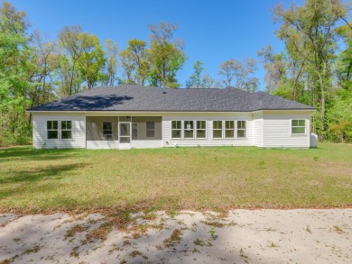 Exquisite new construction overlooking hole 6 of the new, state on Wildwood Country Club in Florida - for sale on GolfHomes.com, golf home, golf lot