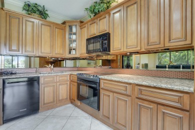 Come enjoy the amazing views of the golf course from your on Boca Pointe Country Club in Florida - for sale on GolfHomes.com, golf home, golf lot