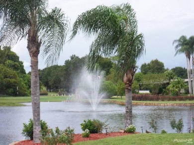 Welcome to your serene sanctuary nestled on an exterior lot of on Lake Henry Golf Club in Florida - for sale on GolfHomes.com, golf home, golf lot