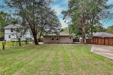 Welcome to this beautifully maintained East Atlanta retreat. A on Charlie Yates Golf Course in Georgia - for sale on GolfHomes.com, golf home, golf lot