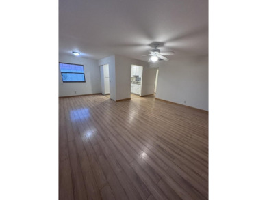 Two-bedroom, 2 bath, end unit villa in the Seville section of on Kings Point Golf - Executive in Florida - for sale on GolfHomes.com, golf home, golf lot