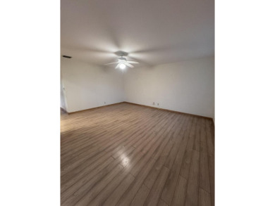 Two-bedroom, 2 bath, end unit villa in the Seville section of on Kings Point Golf - Executive in Florida - for sale on GolfHomes.com, golf home, golf lot